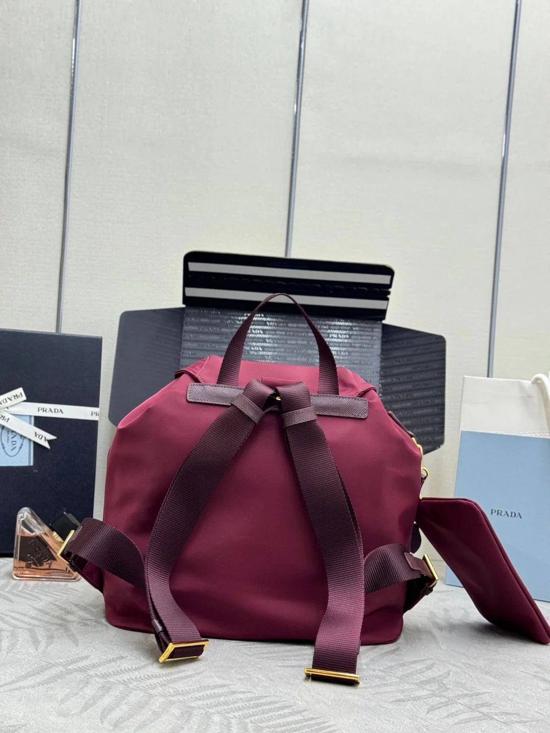 PRADA 25S RE-EDITION 1978 SMALL BACKPACK 32 IN BURGUNDY RE-NYLON