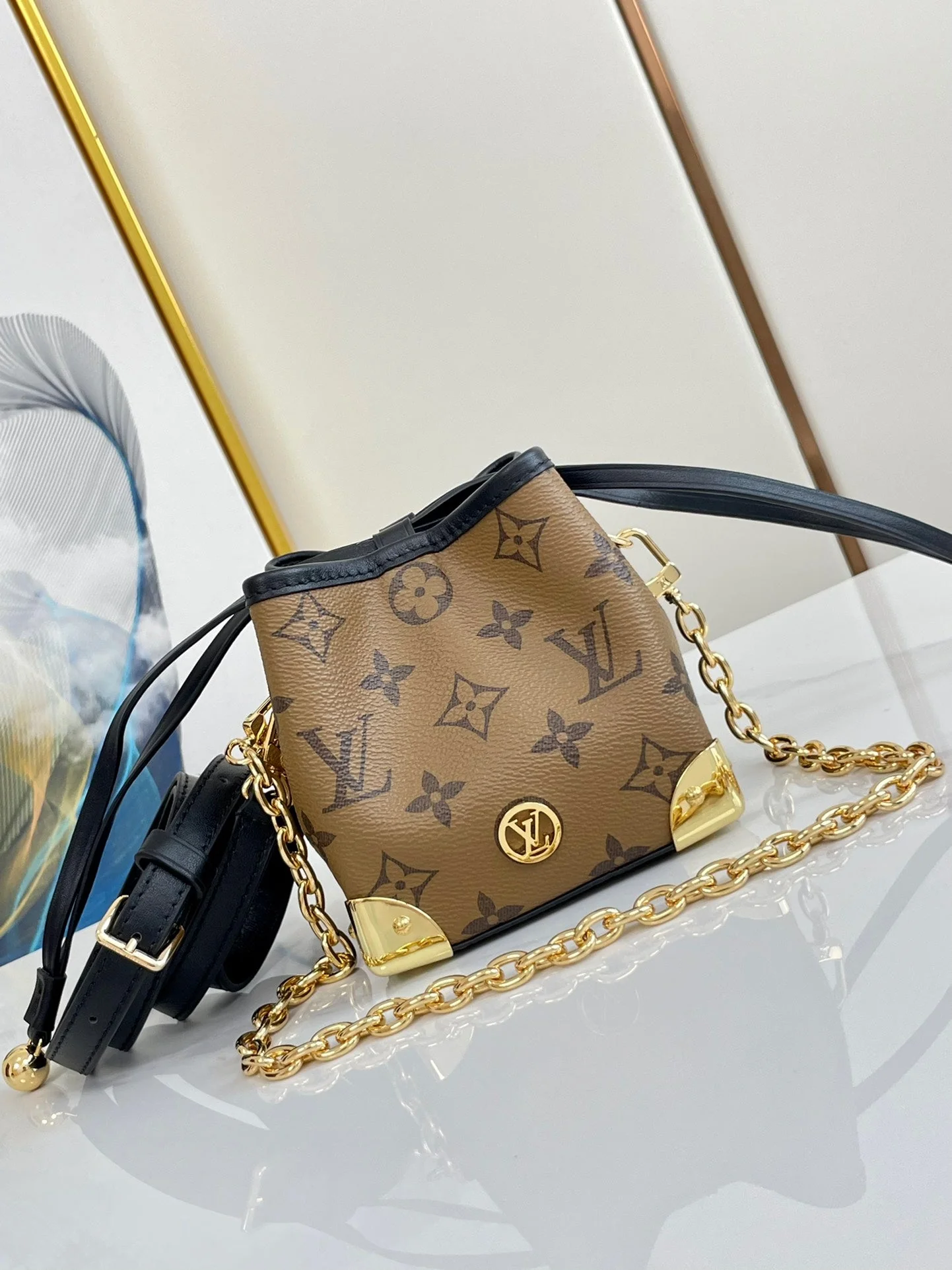 NOE PURSE 11.5 NANO CHARM BROWN MONOGRAM REVERSE CANVAS
