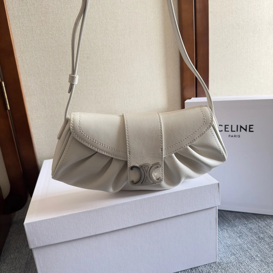 TEEN POLLY 29 IN WHITE CALFSKIN SILVER HARDWARE