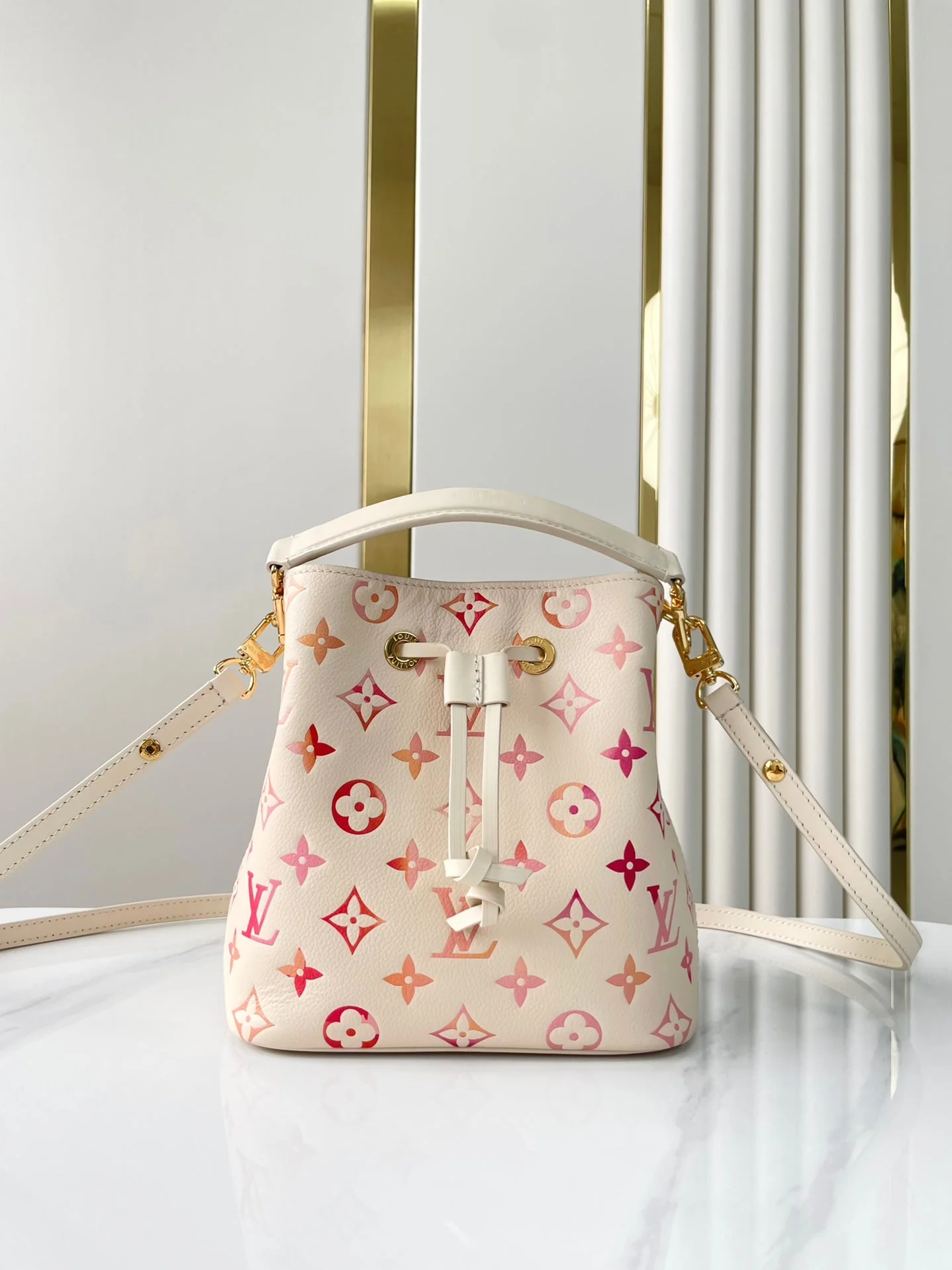 NÉONOÉ BB 20 IN SUNRISE AQUARELLE MONOGRAM EMPREINTE LEATHER