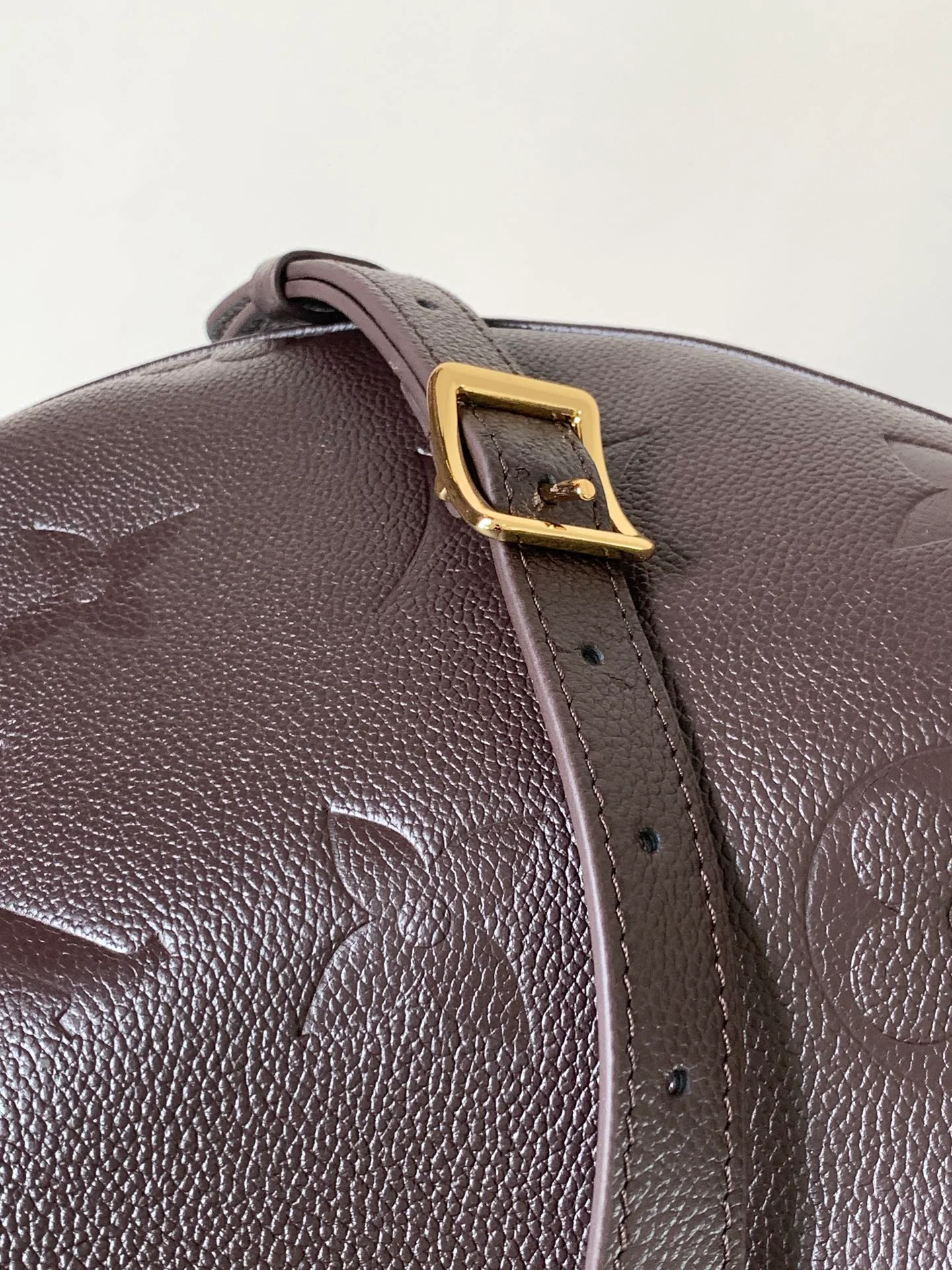 LOOP HOBO 38 IN DARK BROWN MONOGRAM CALFSKIN EMBOSSED LOGO