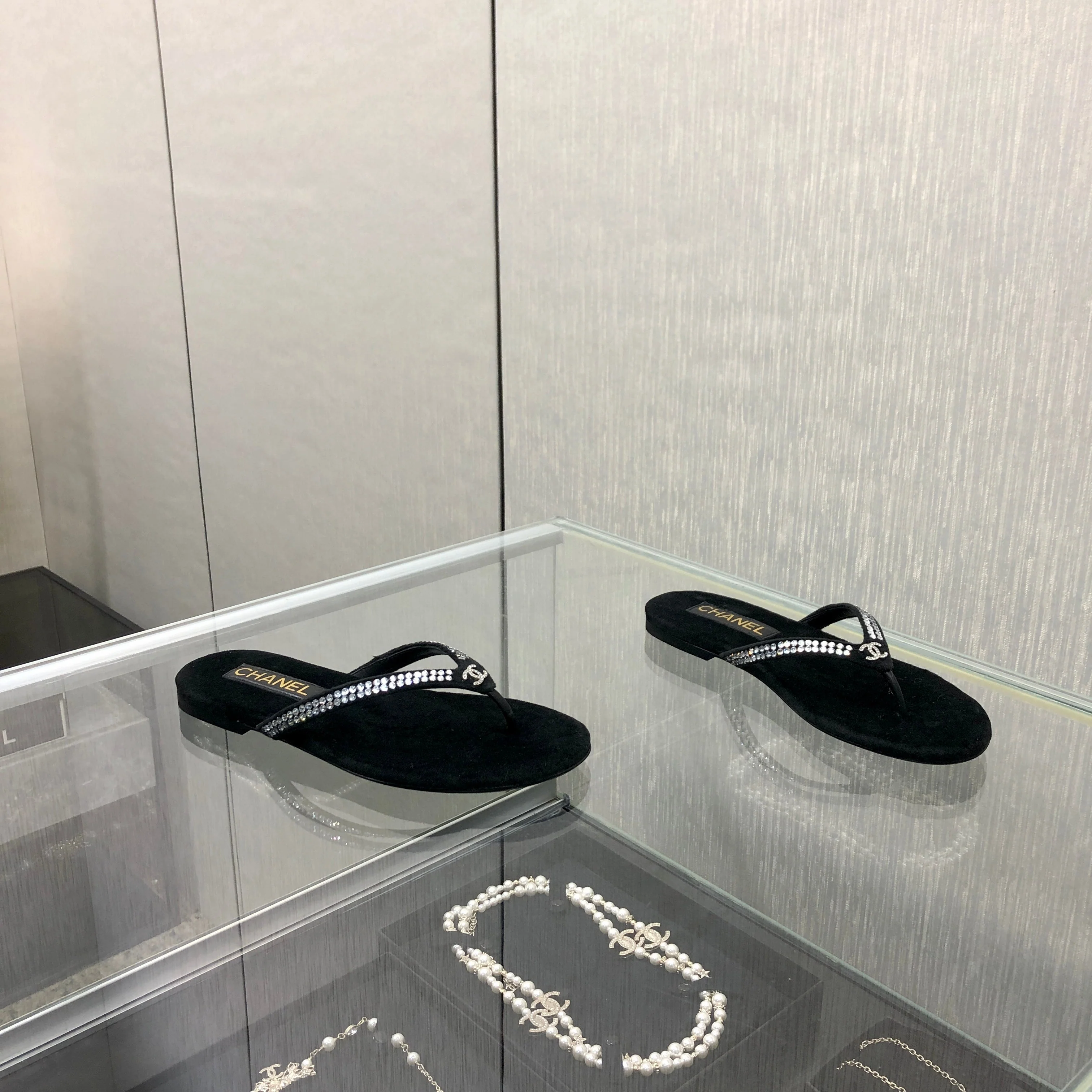 THONG SLIDE IN BLACK SUEDE WITH WHITE RHINSTONES