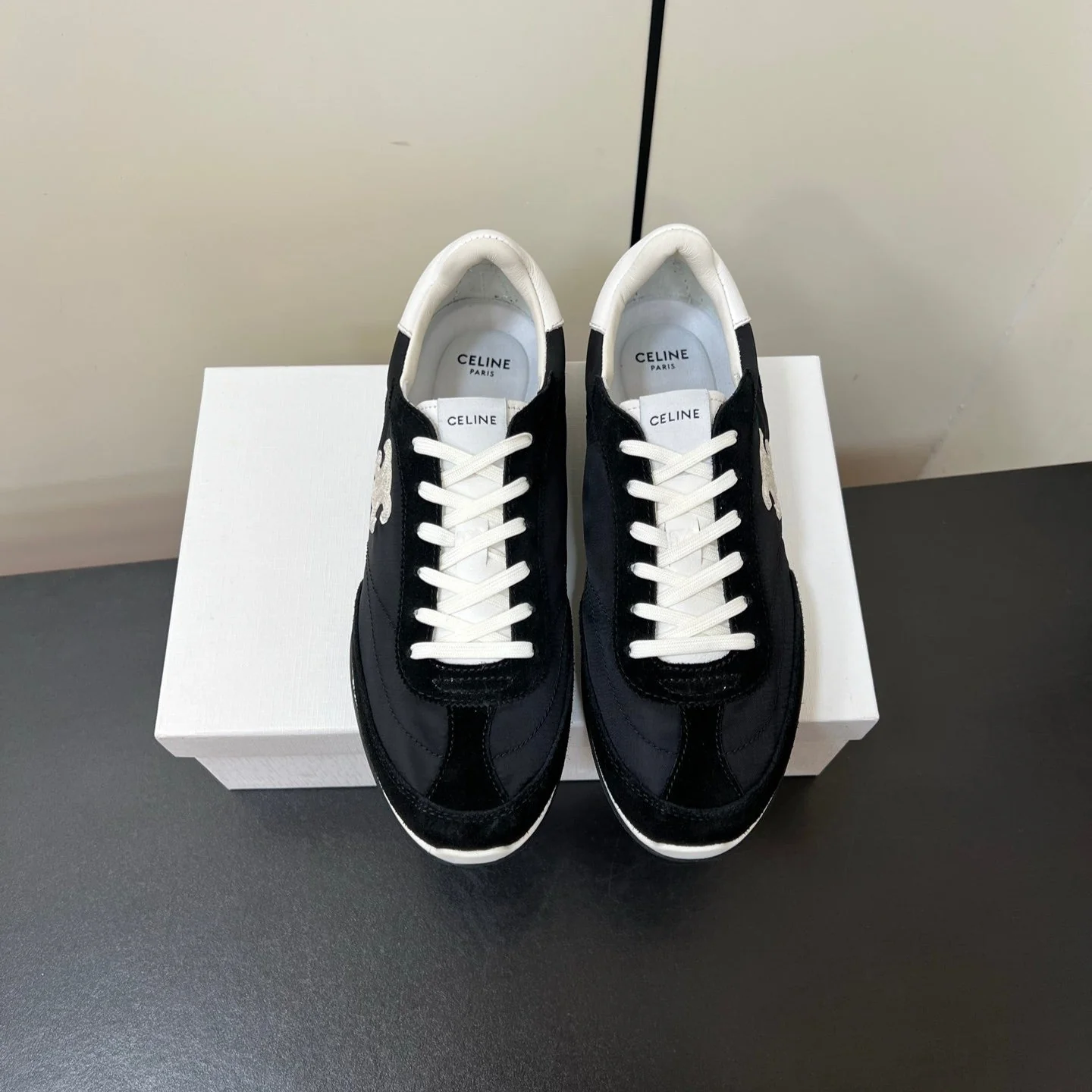 CELINE 25S RACER FORREST GUMP SNEAKERS IN BLACK MERCERIZED CALFSKIN