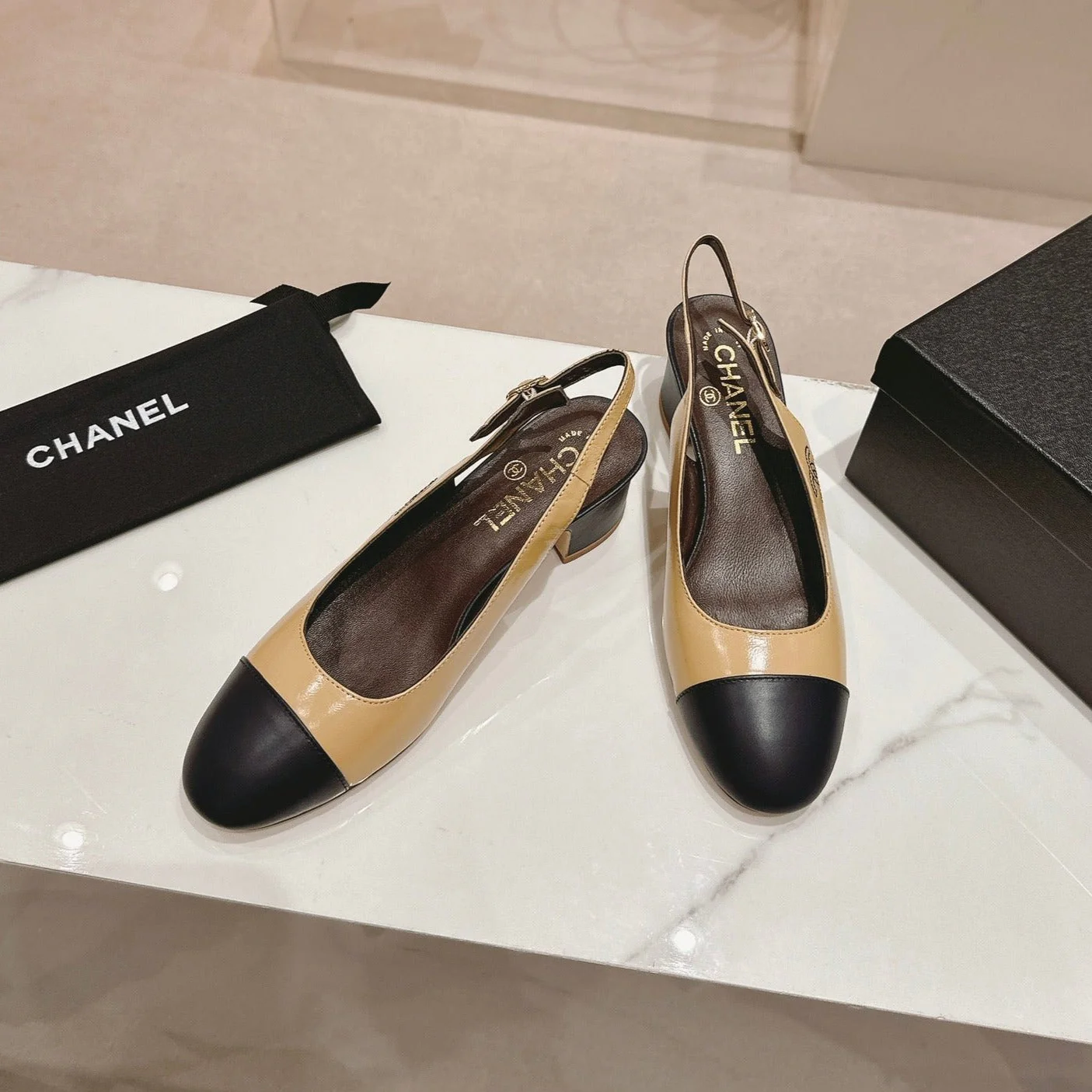 SLINGBACKS PEANUT BROWN MIX BLACK SHEEPSKIN