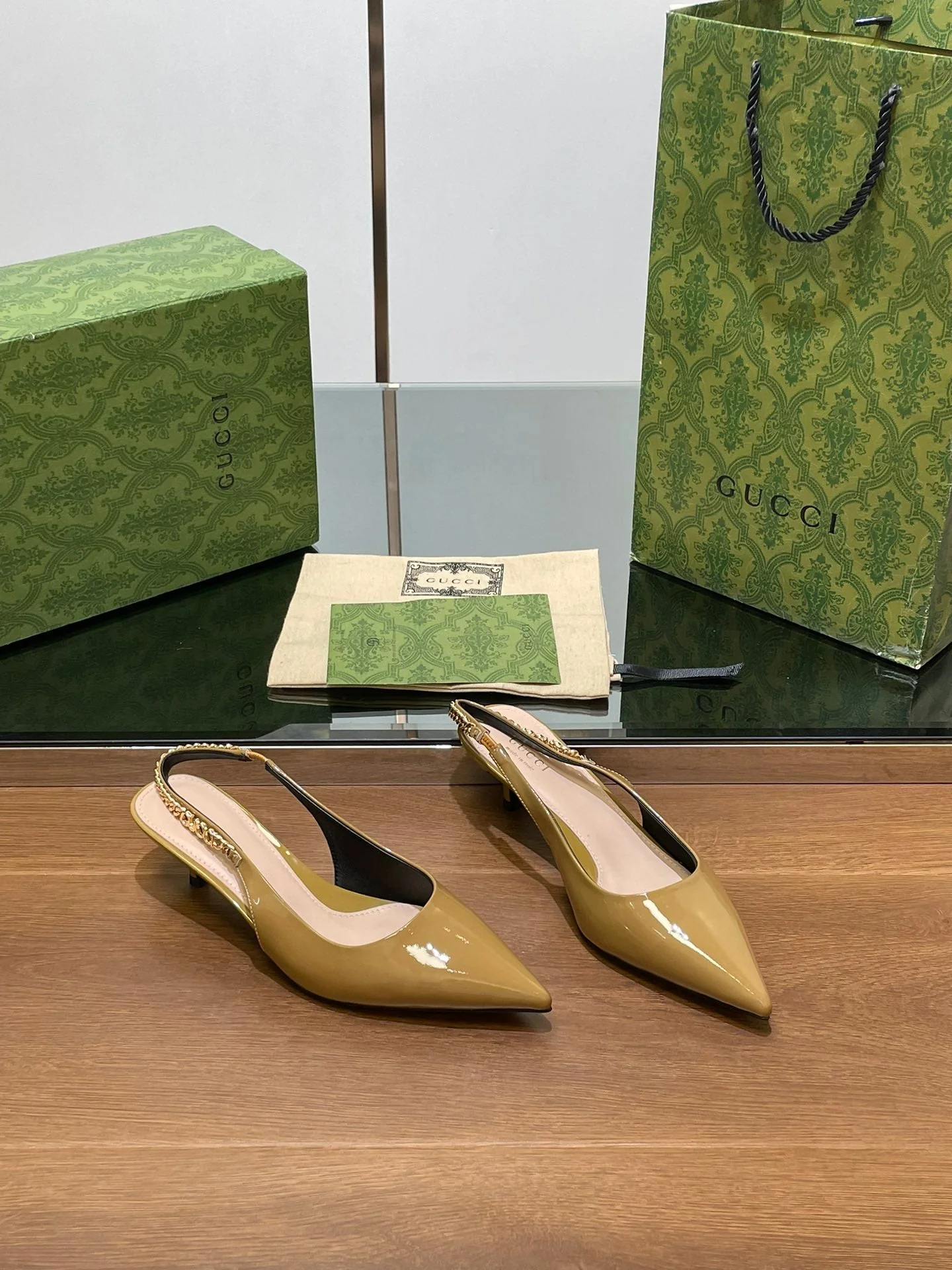 GG HIGH SLINGBACK 4.5 CM IN DIJON YELLOW GLOSSY CALFSKIN WITH GOLD HARDWARE