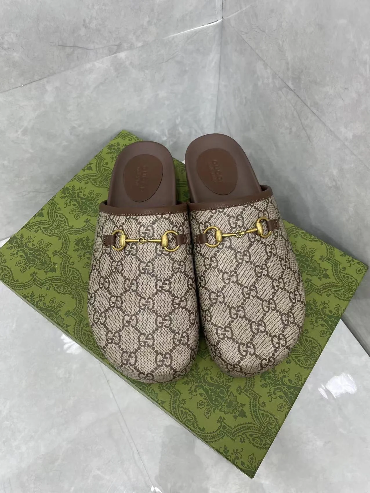 MULE WITH GOLD HORSEBIT IN BEIGE AND EBONY MONOGRAM CANVAS