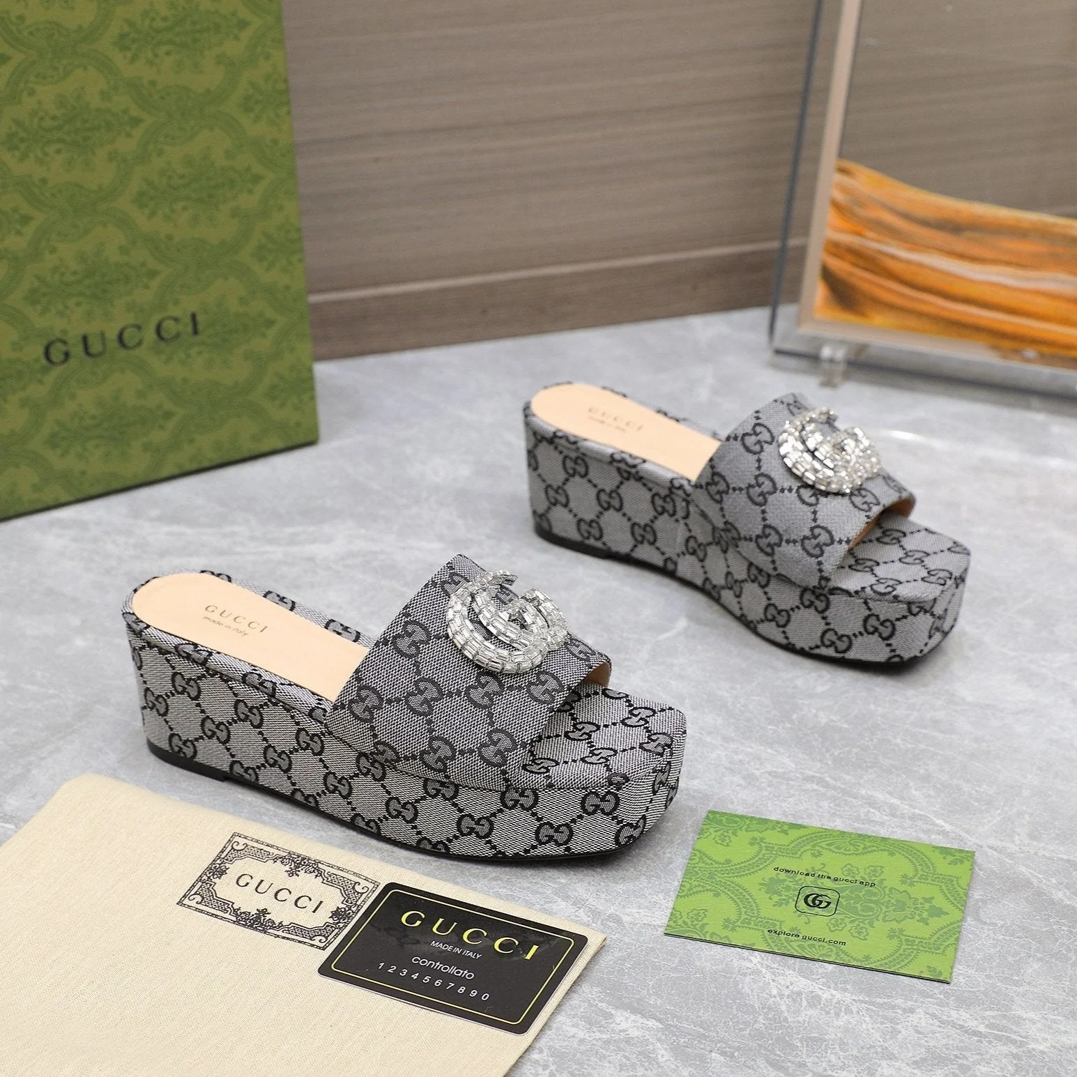 HIGH WEDGE PLATFORM WITH DOUBLE G IN GRAY CANVAS