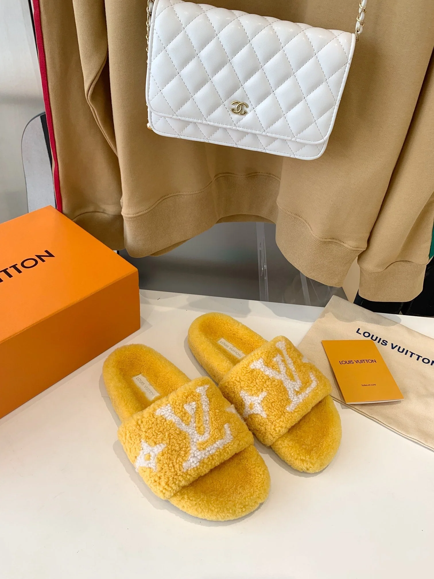 LV WOMEN'S PASEO FLAT SLIPPER IN YELLOW FLEECE WITH WHITE LOGO