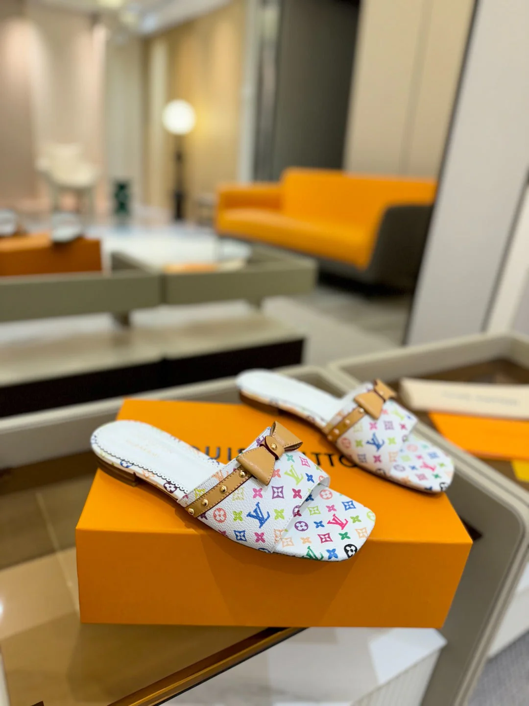 LV X TM 6AM FLAT MULE IN WHITE MONOGRAM CALFSKIN