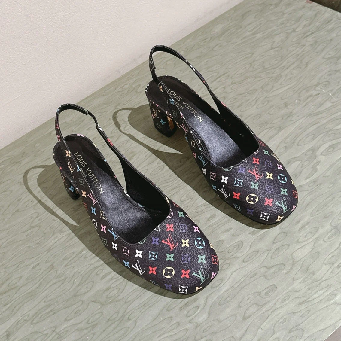 SWING SLINGBACK PUMP 55 MM IN BLACK MONOGRAM CALFSKIN