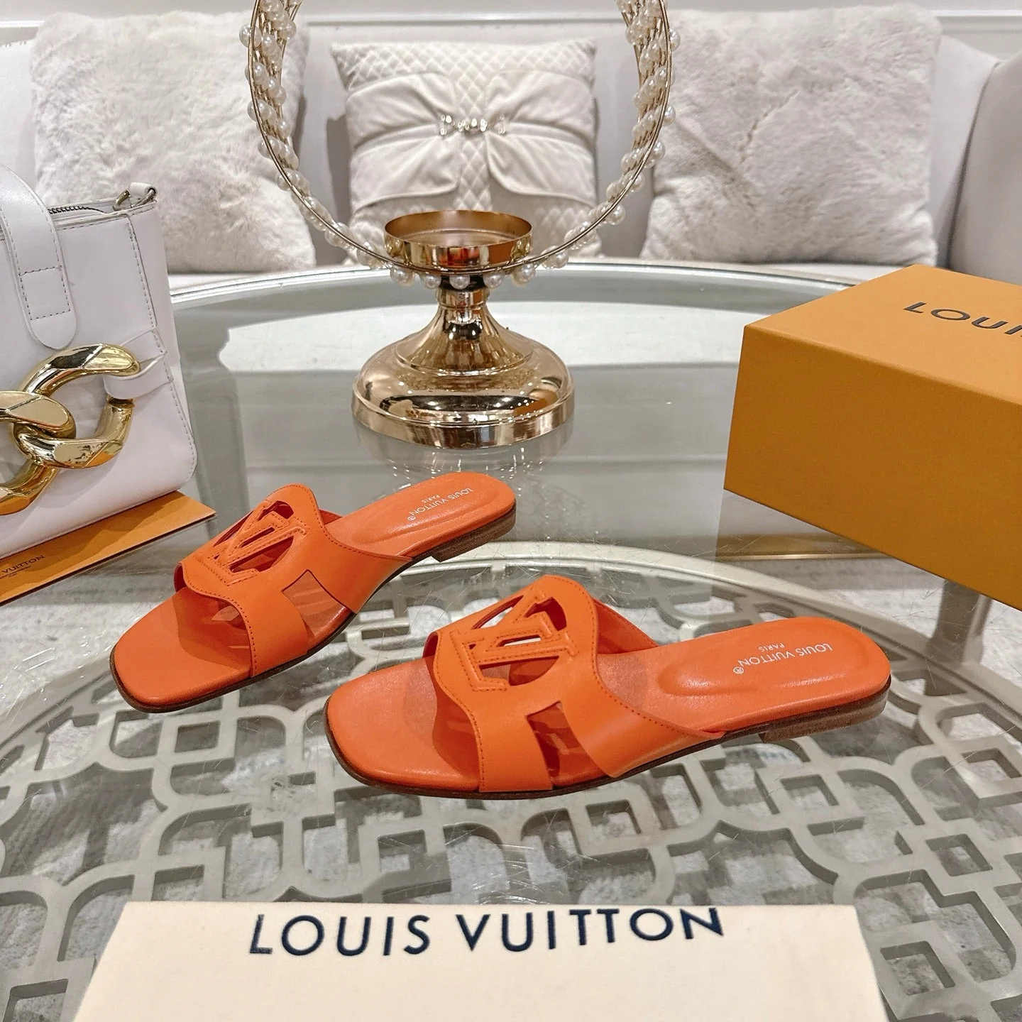 ISOLA FLAT SLIDE IN VIVID ORANGE CALFSKIN