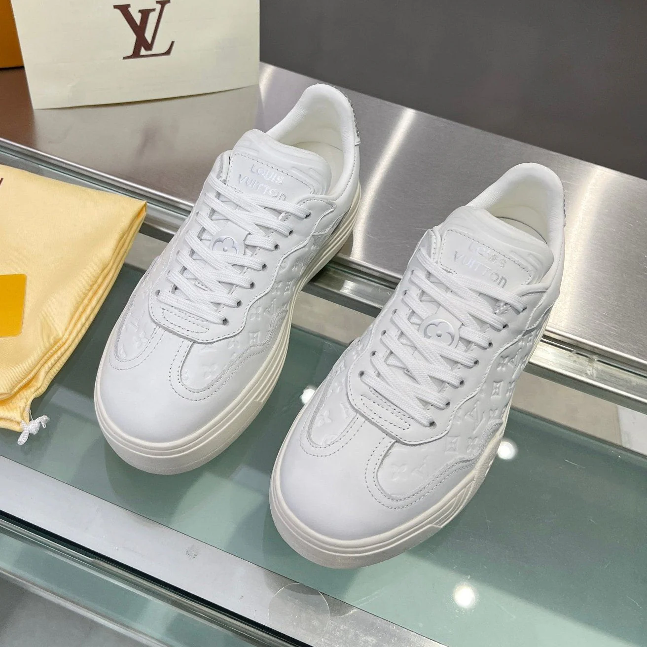 LV WOMEN GROOVY PLATFORM IN WHITE EMBOSSED CALFSKIN