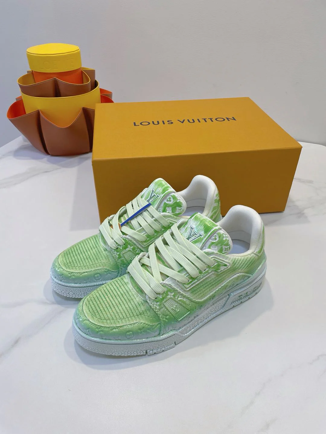 LV TRAINER MAXI SNEAKER IN GREEN PASTEL EMBOSSED CALFSKIN