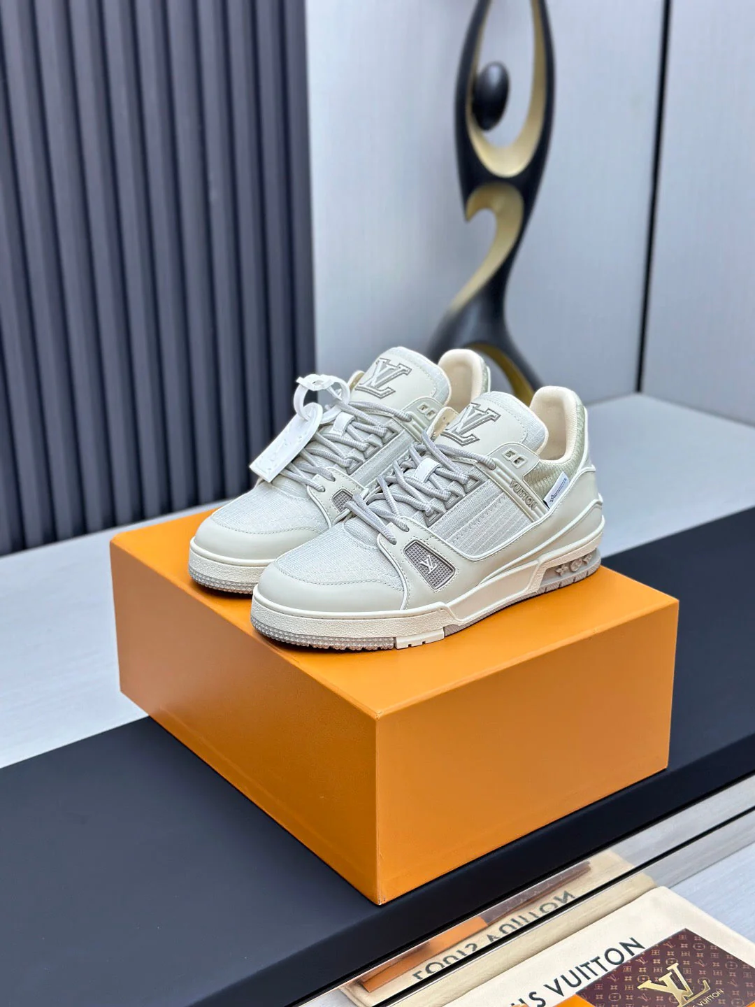 LV TRAINER SNEAKER IN GREY CALFSKIN