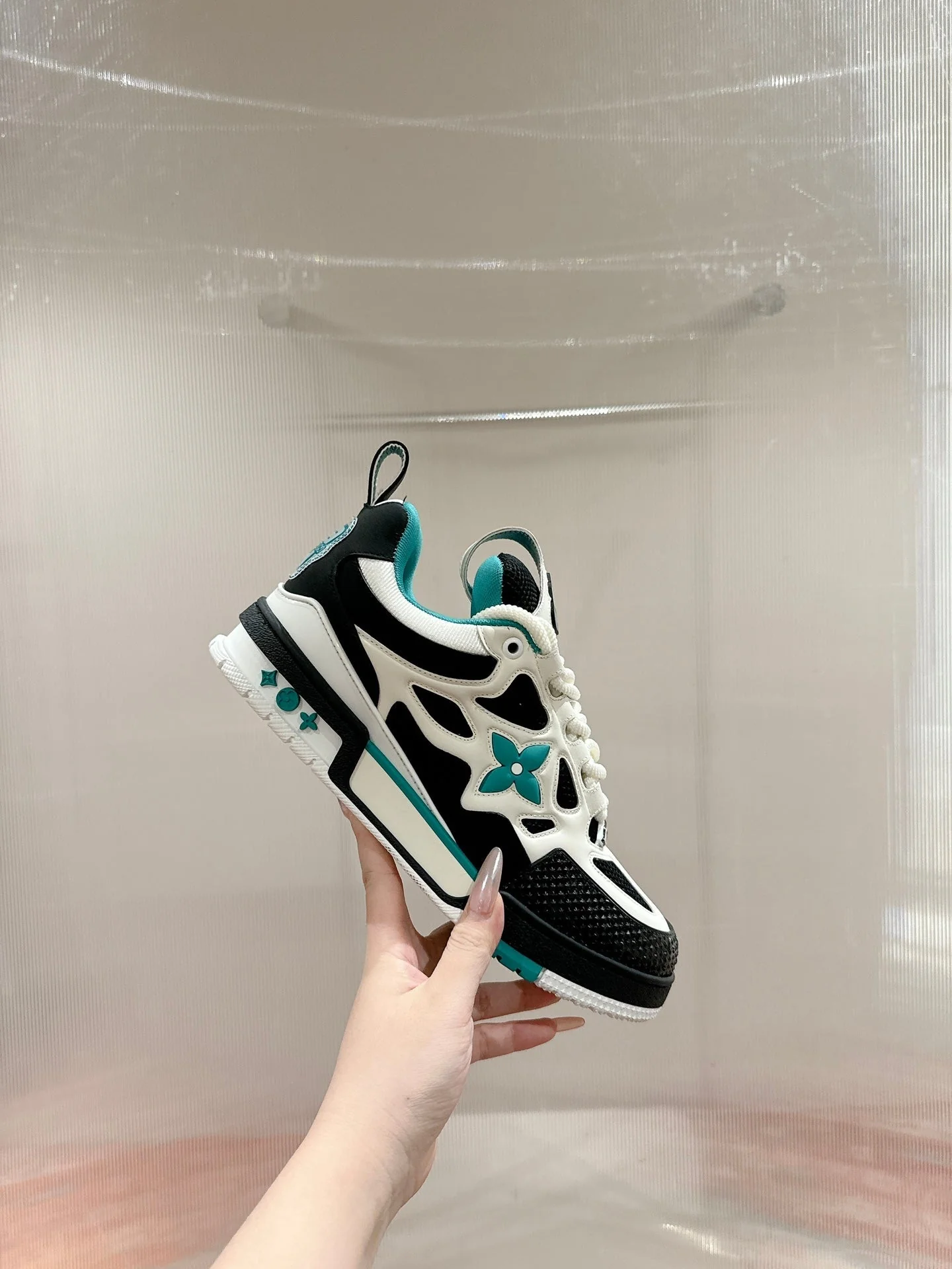 LV SKATE SNEAKER IN WHITE MIX BLACK AND PERSIAN GREEN CALFSKIN