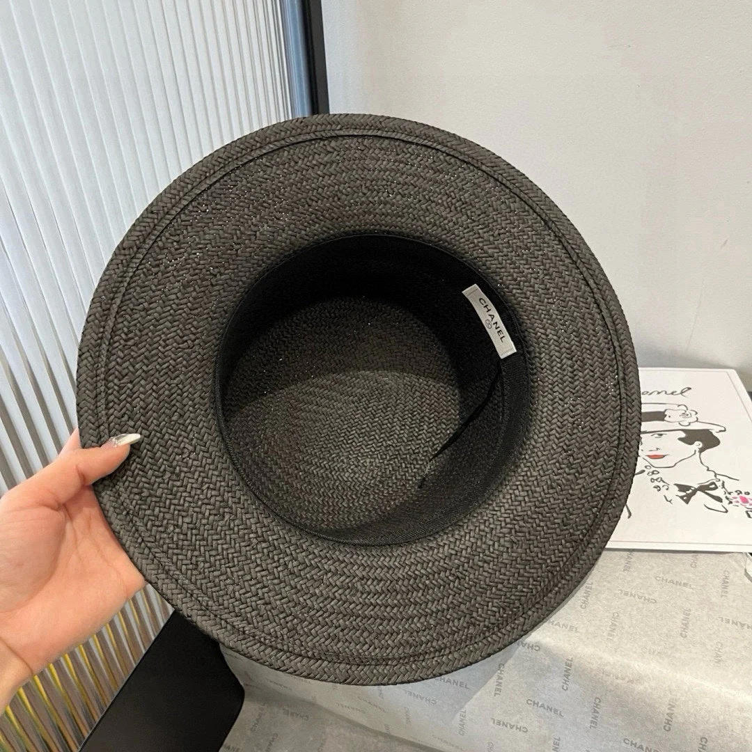 FLAT STRAW HAT BLACK FLOWER ATTACHMENT 673929