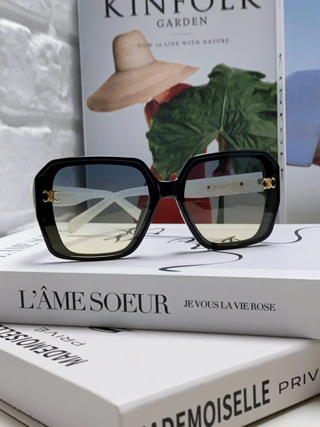 TRIOMPHE SUNGLASSES 548593 IN BLACK AND WHITE ACETATE
