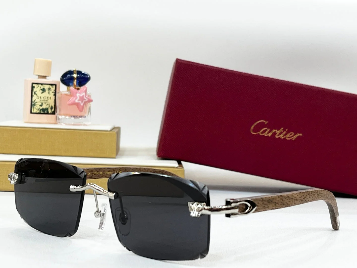 C DE RIMLESS RECTANGULAR FRAME SUNGLASSES CT0612S IN METAL