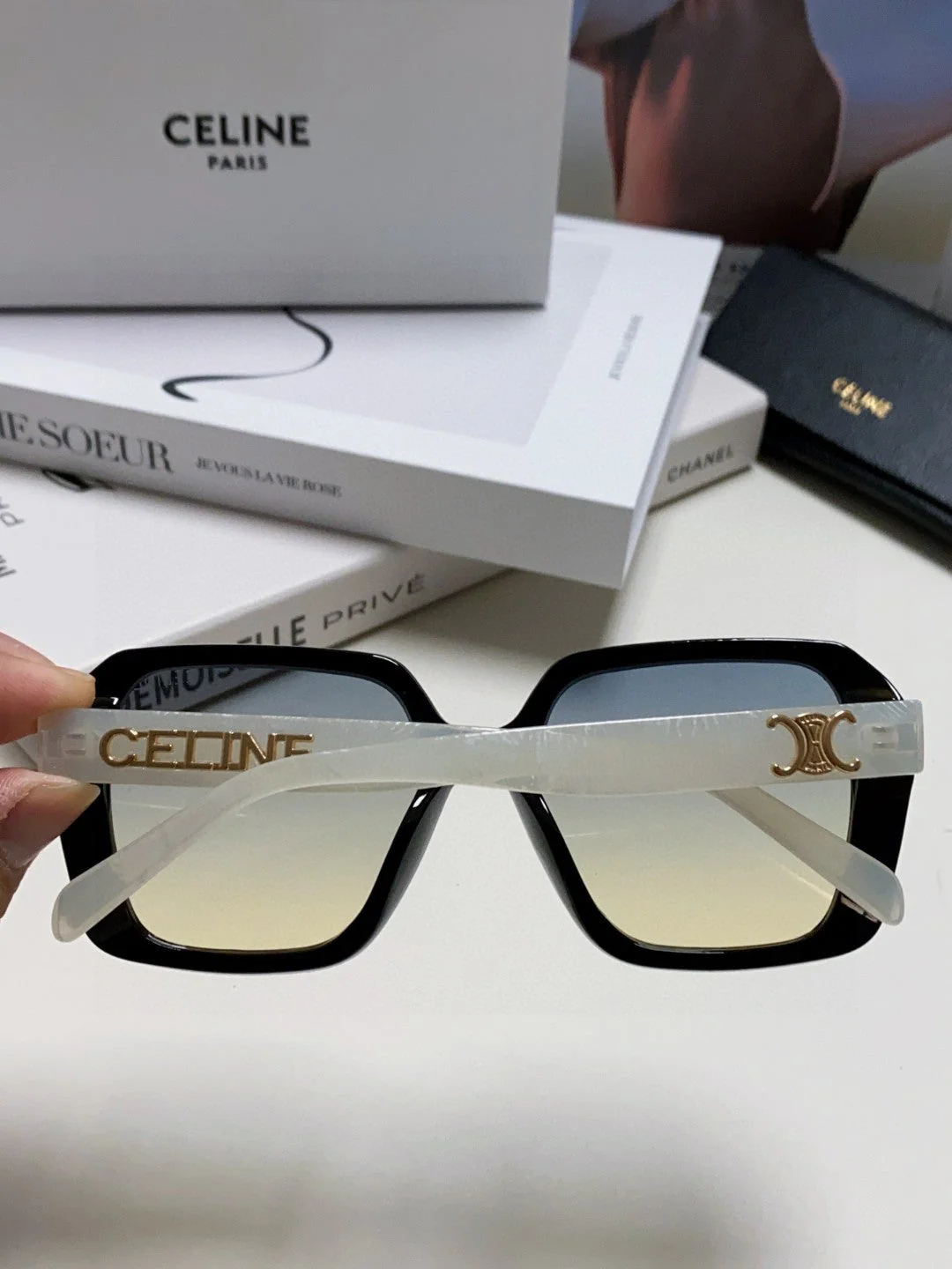 TRIOMPHE SUNGLASSES 548593 IN BLACK AND WHITE ACETATE