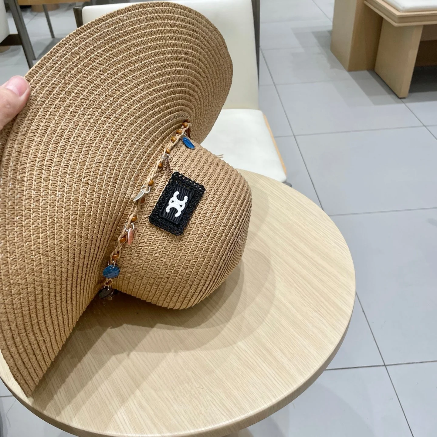 WIDE BRIM HAT MODEL 652183 IN NATURAL WOVEN STRAW