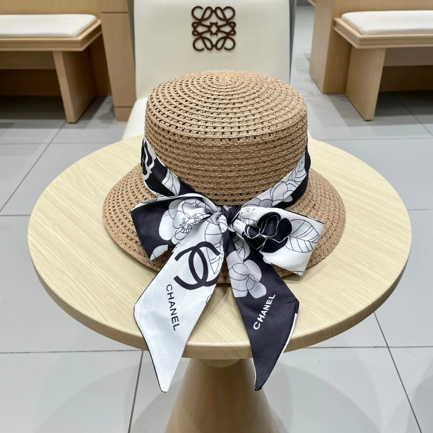 NATURAL STRAW BUCKET HAT WITH RIBBON 672771