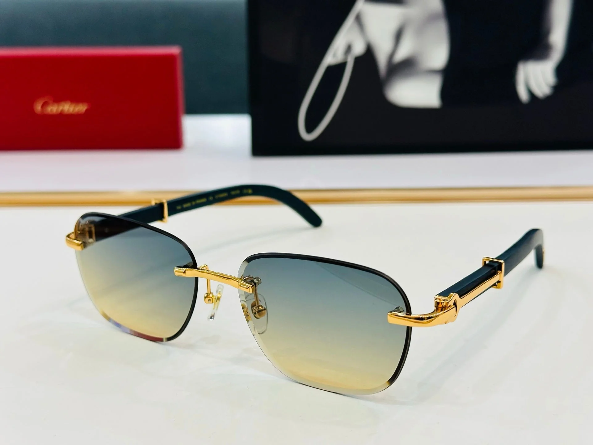C DE RIMLESS SQUARE FRAME SUNGLASSES CT0605S IN METAL AND WOODEN