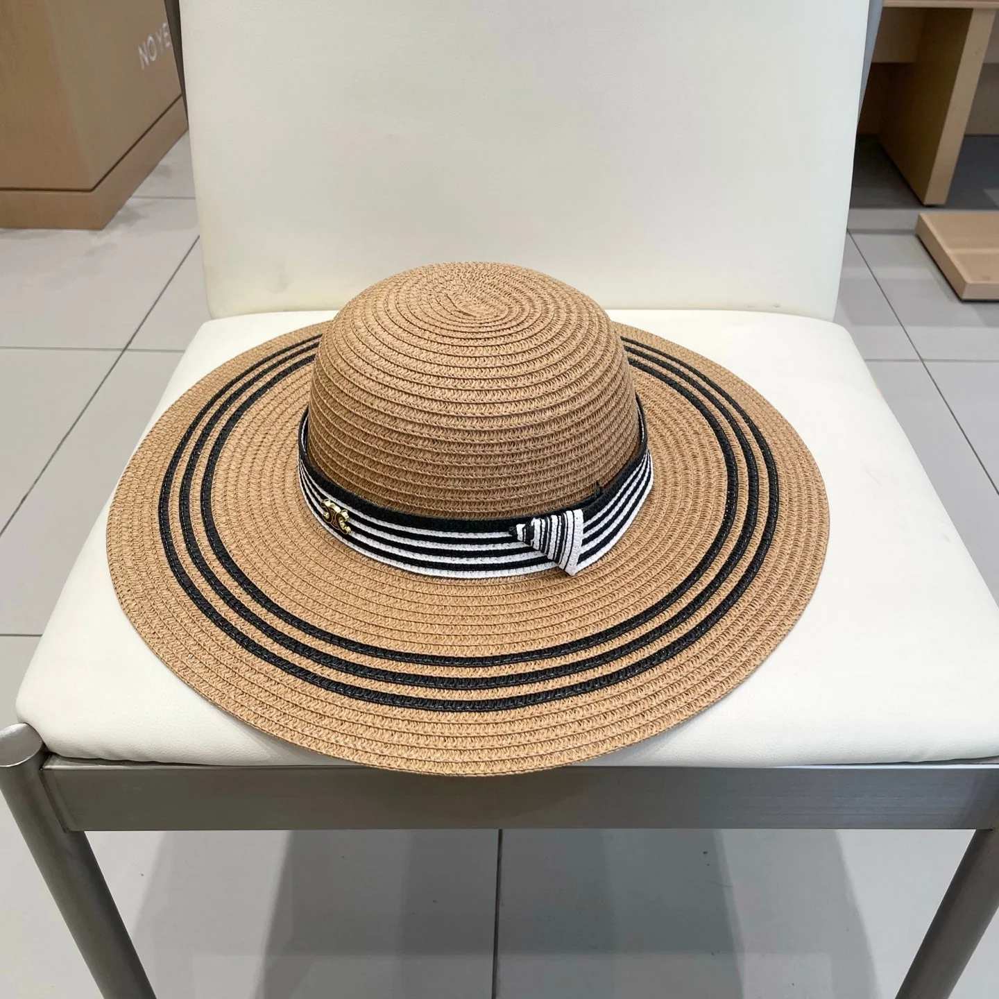 WIDE BRIM HAT MODEL 650410 IN BROWN WITH BLACK STRIPES WOVEN STRAW