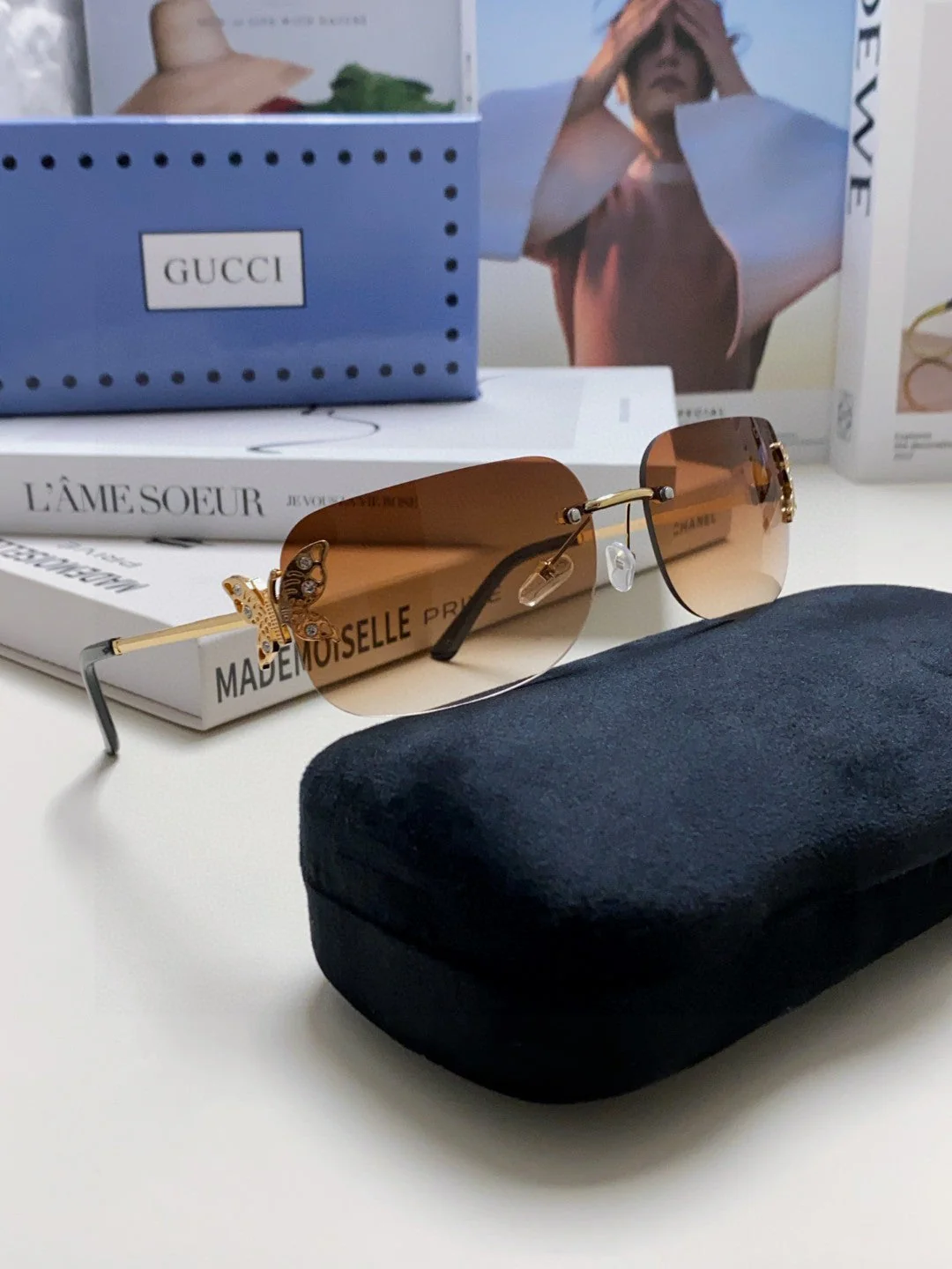 BUTTERFLY EMBELLISHED RIMLESS RECTANGULAR FRAME SUNGLASSES 570245 IN METAL