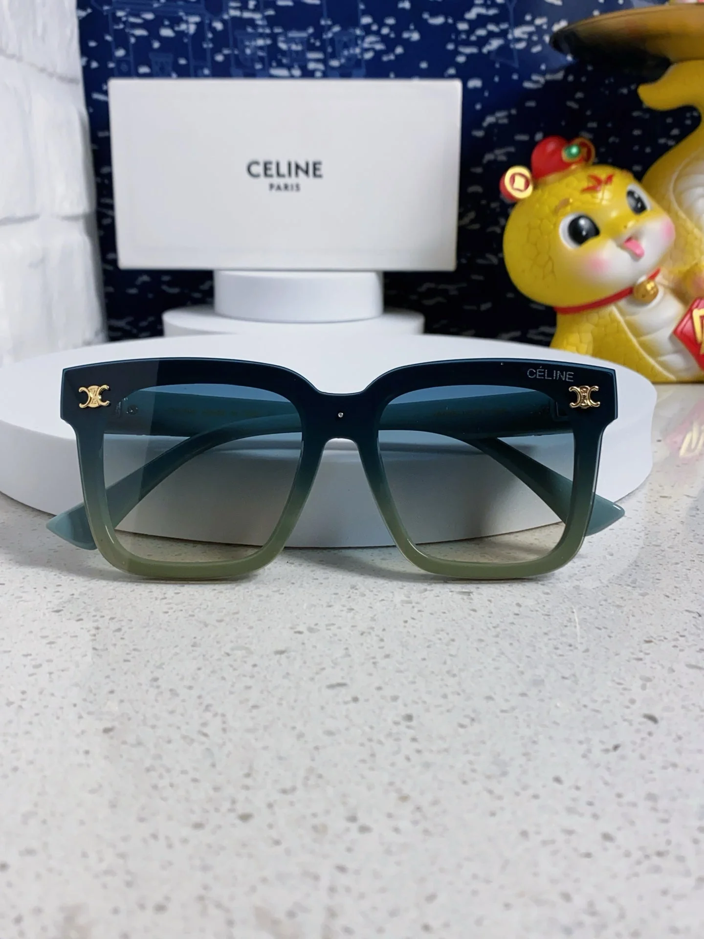 TRIOMPHE SUNGLASSES 548632 IN BABY BLUE ACETATE