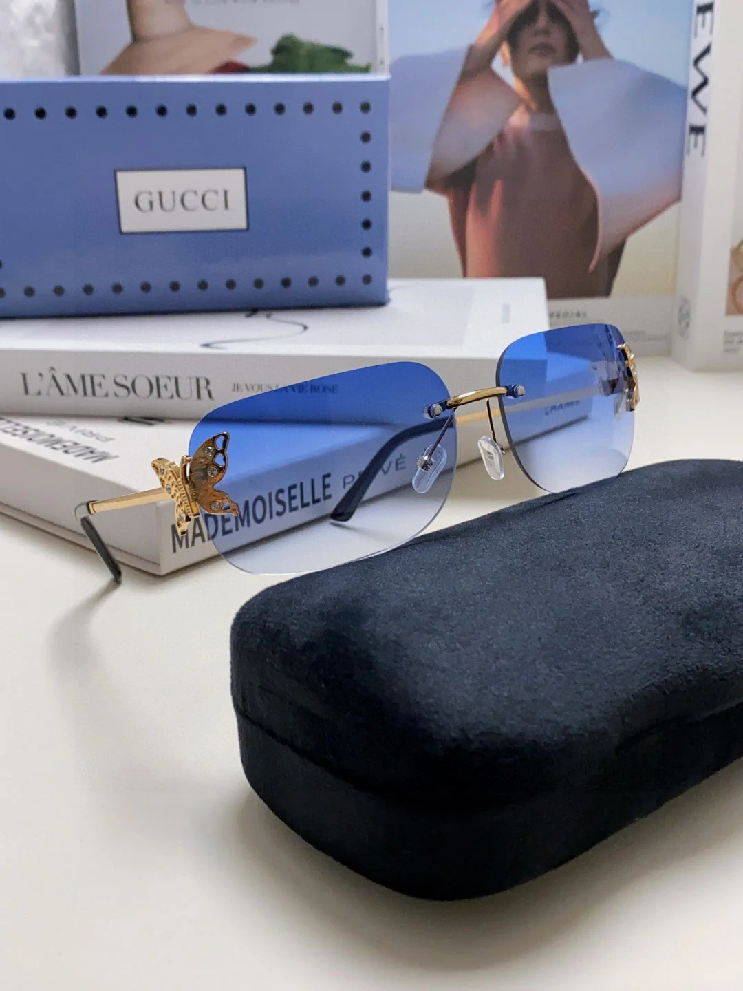BUTTERFLY EMBELLISHED RIMLESS RECTANGULAR FRAME SUNGLASSES 570245 IN METAL