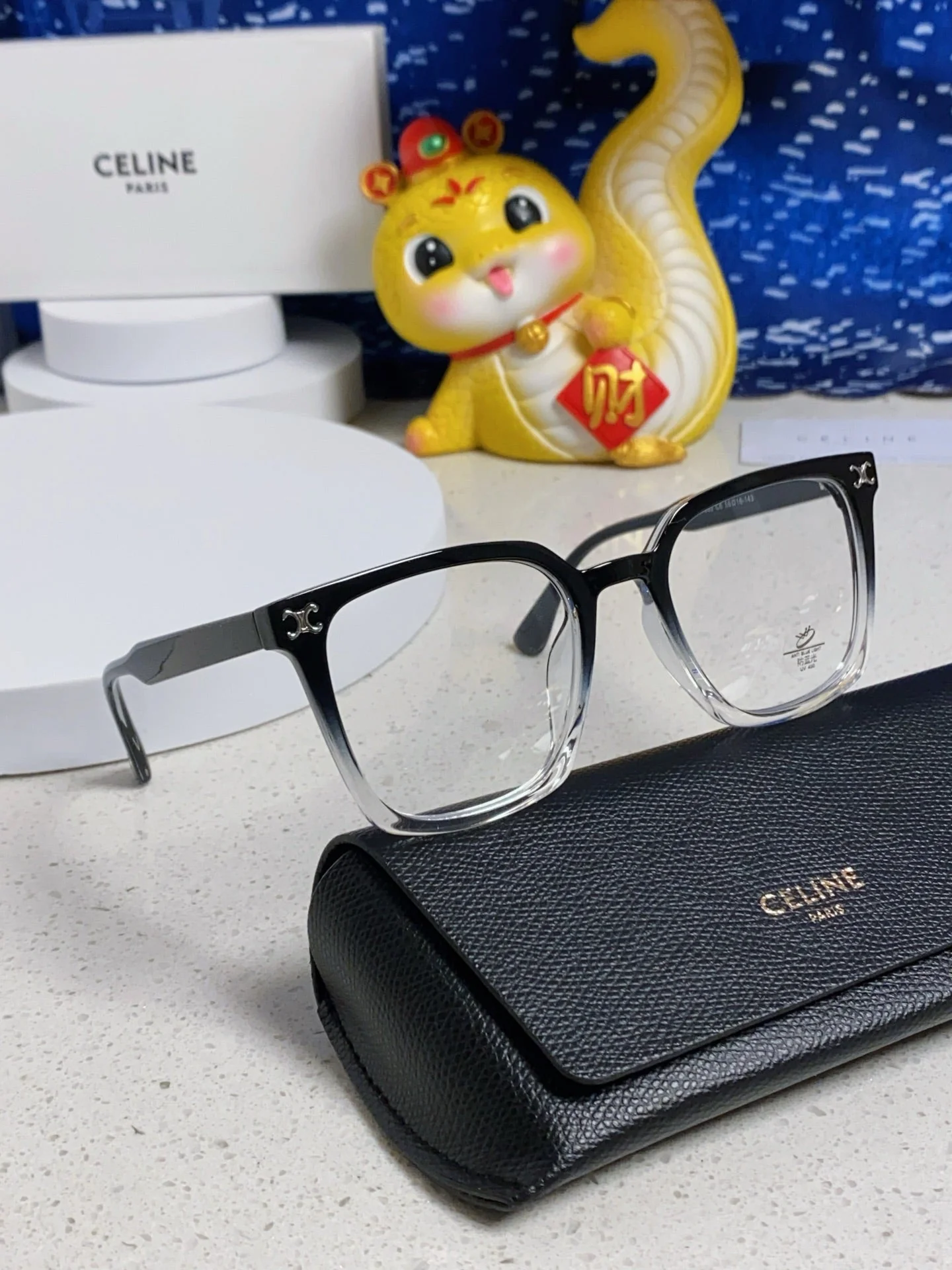 TRIOMPHE SUNGLASSES 563255 IN BLACK TO CLEAR ACETATE