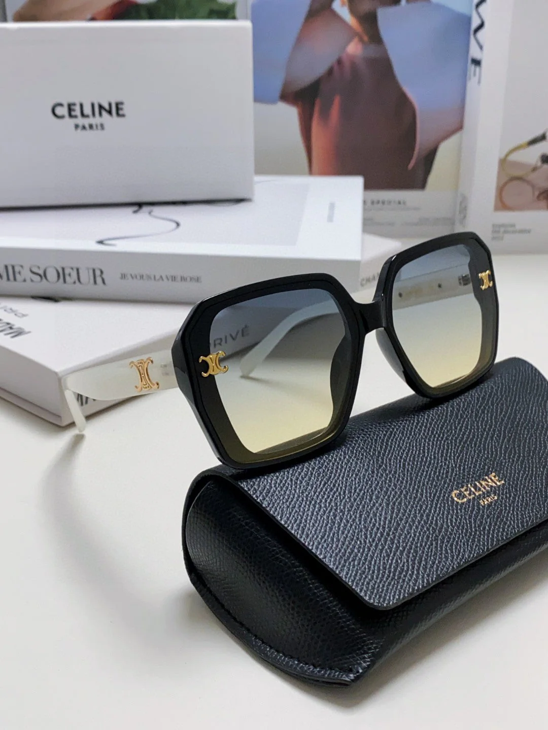 TRIOMPHE SUNGLASSES 548593 IN BLACK AND WHITE ACETATE