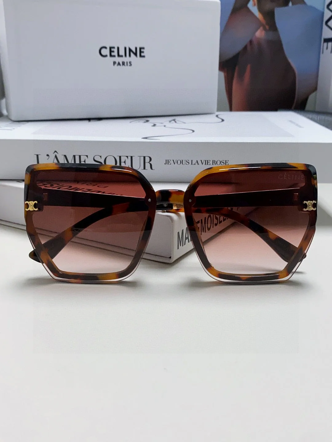 TRIOMPHE SUNGLASS 497830 IN HAVANA ACETATE EMBOSSED LOGO