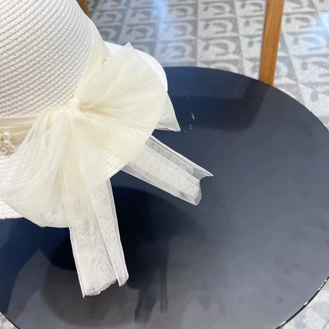 STRAW HAT BOW WITH PEARL WHITE 672700