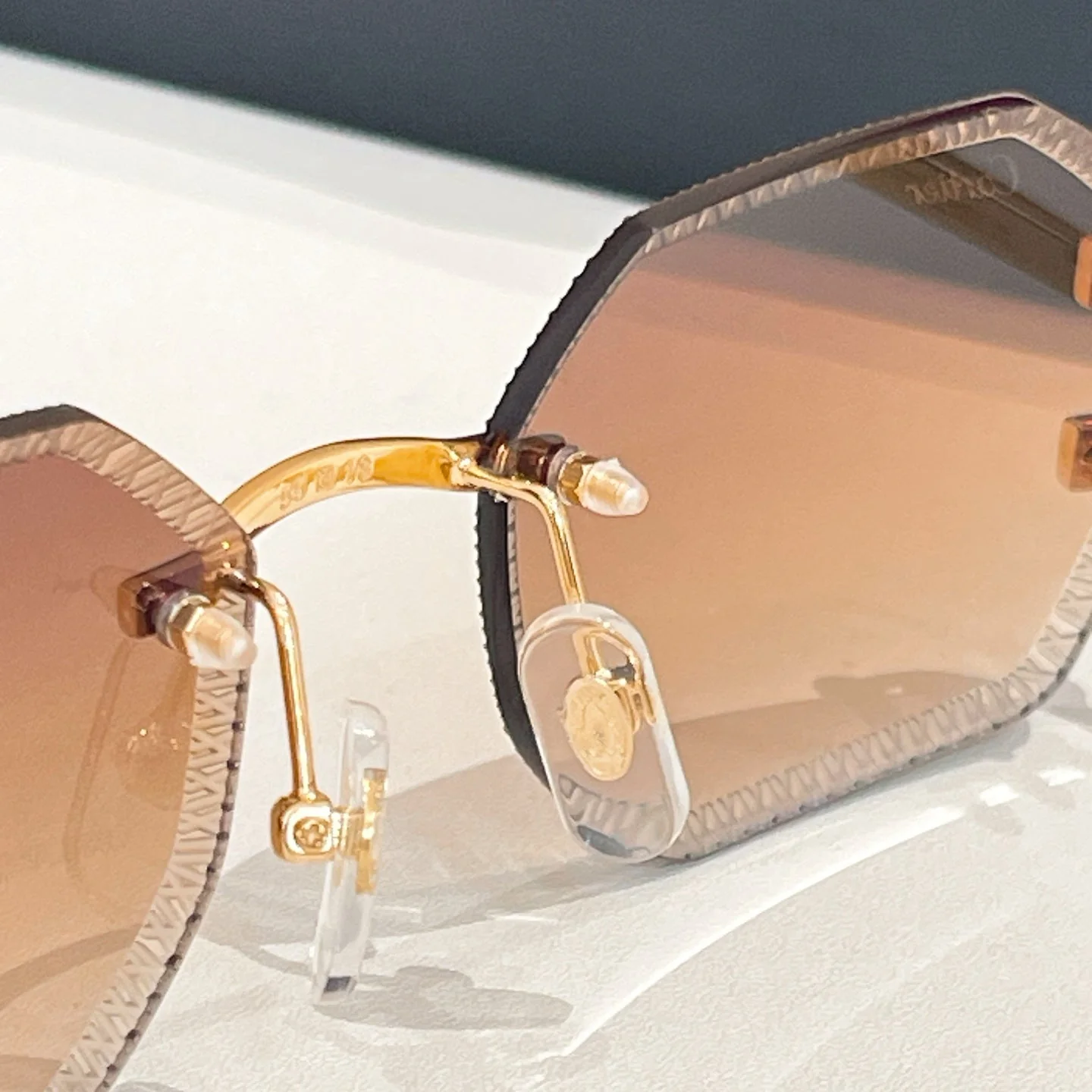 C DE RIMLESS GEOMETRIC FRAME SUNGLASSES CT0092O IN METAL