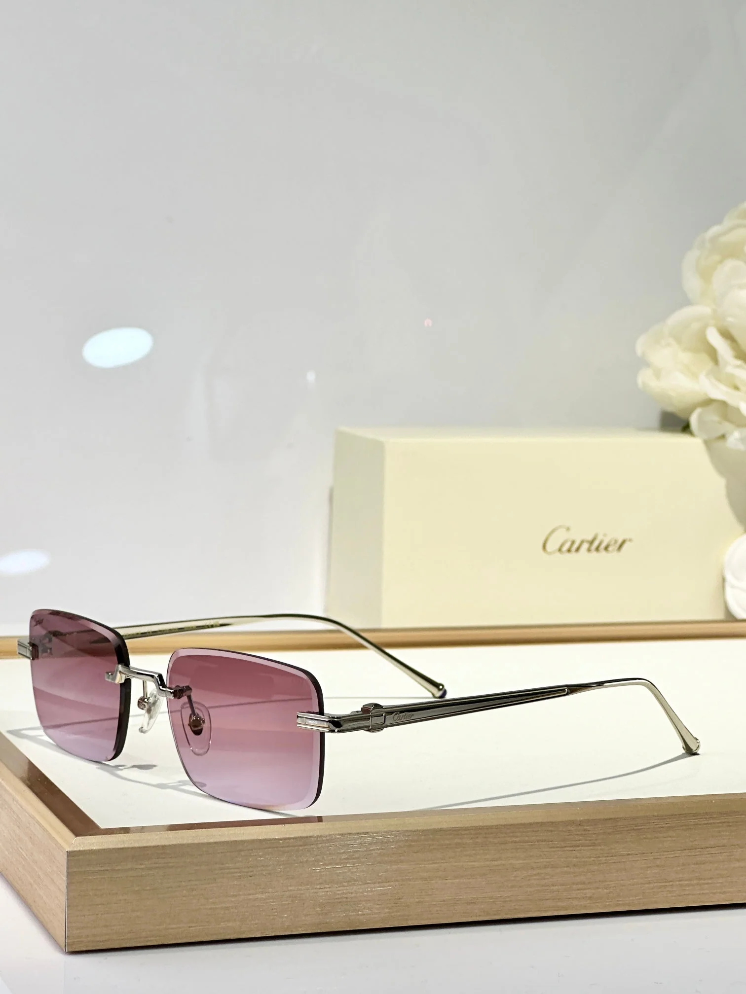 C DE RIMLESS SQUARE FRAME SUNGLASSES CT0610S IN METAL