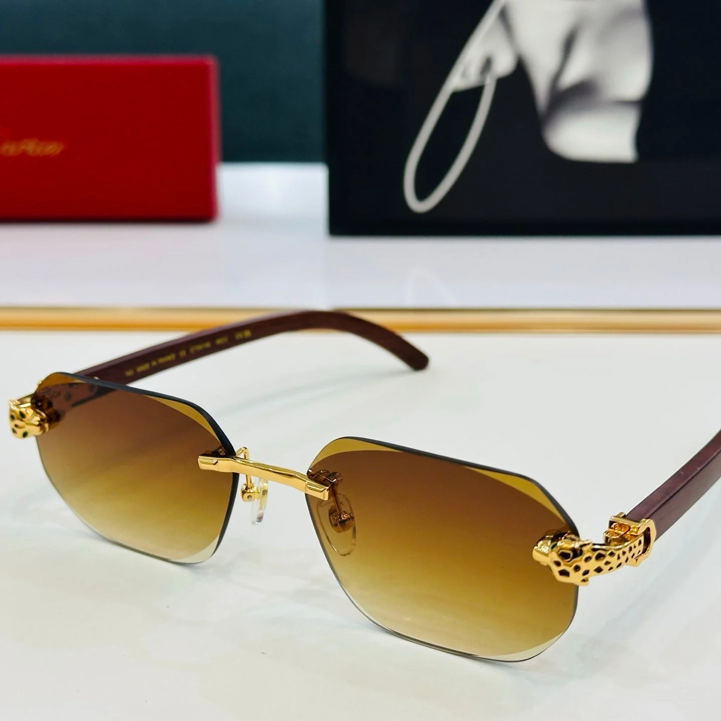 PANTHÈRE RIMLESS OVAL FRAME SUNGLASSES  543637 IN METAL