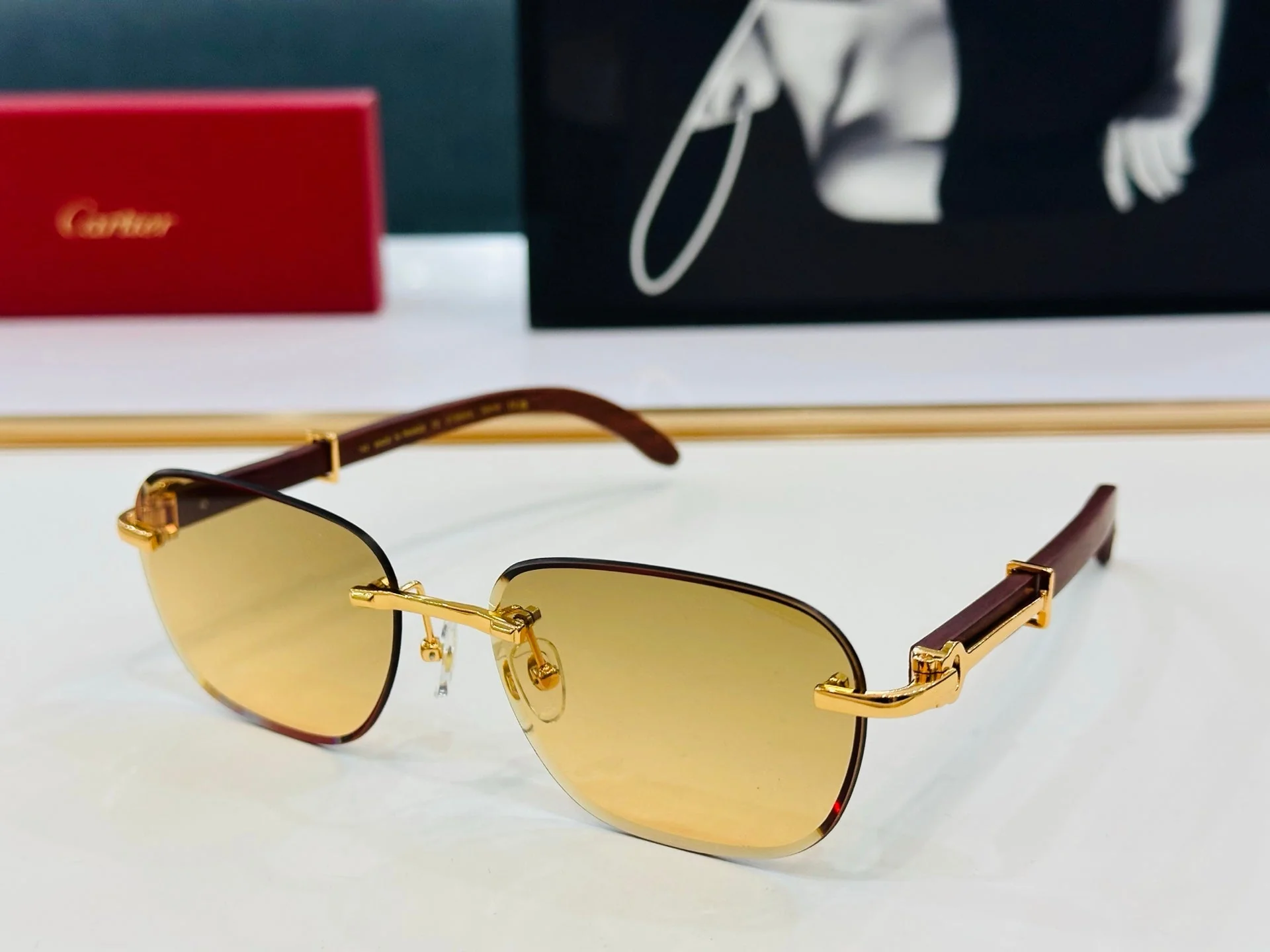 C DE RIMLESS SQUARE FRAME SUNGLASSES CT0605S IN METAL AND WOODEN