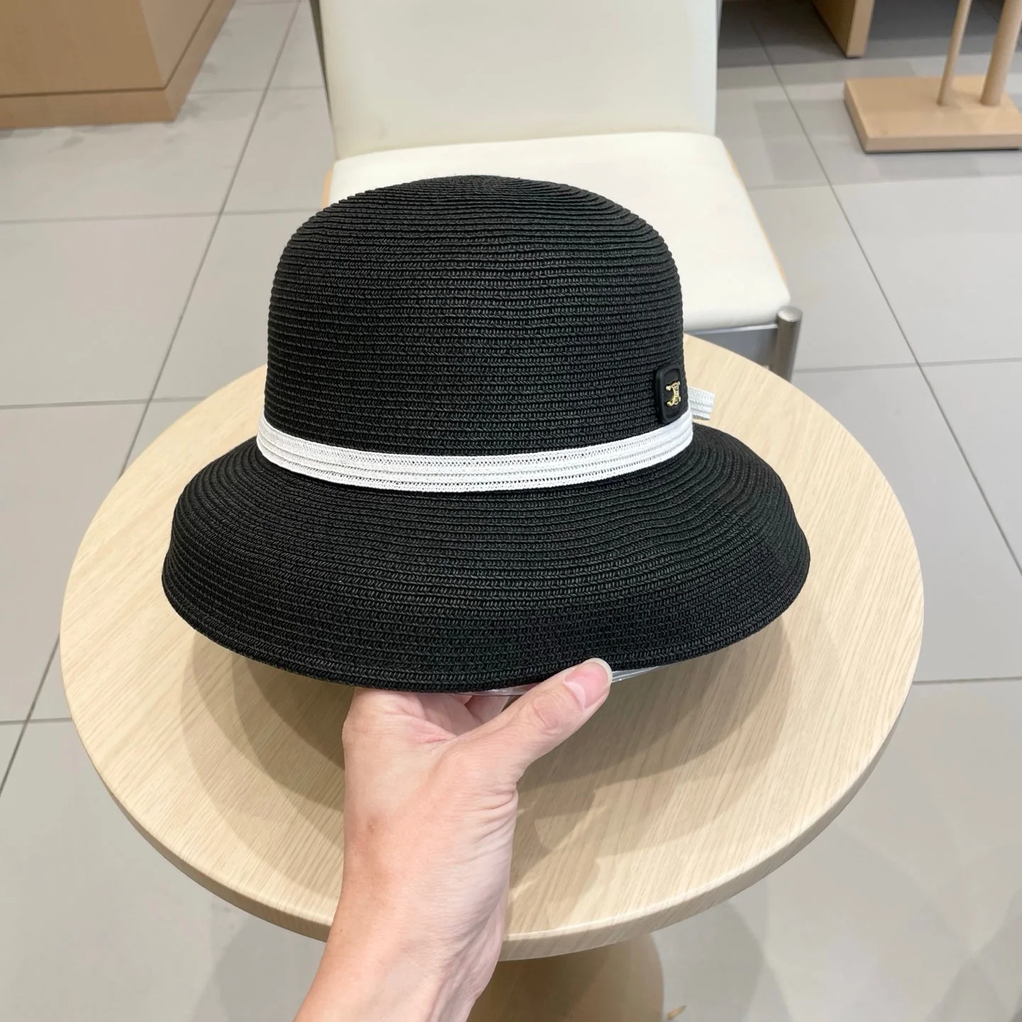 BUKET HAT MODEL 650561 IN BLACK SPRAY FABRIC