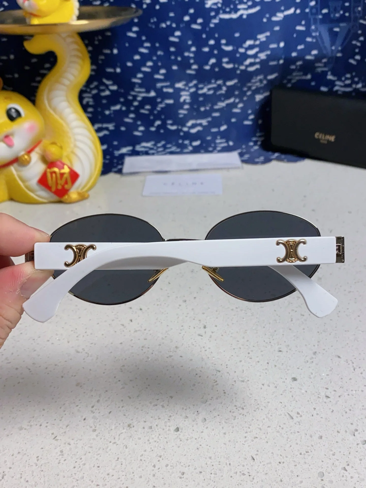 TRIOMPHE SUNGLASS 538530 IN WHITE ACETATE BLACK LENSES