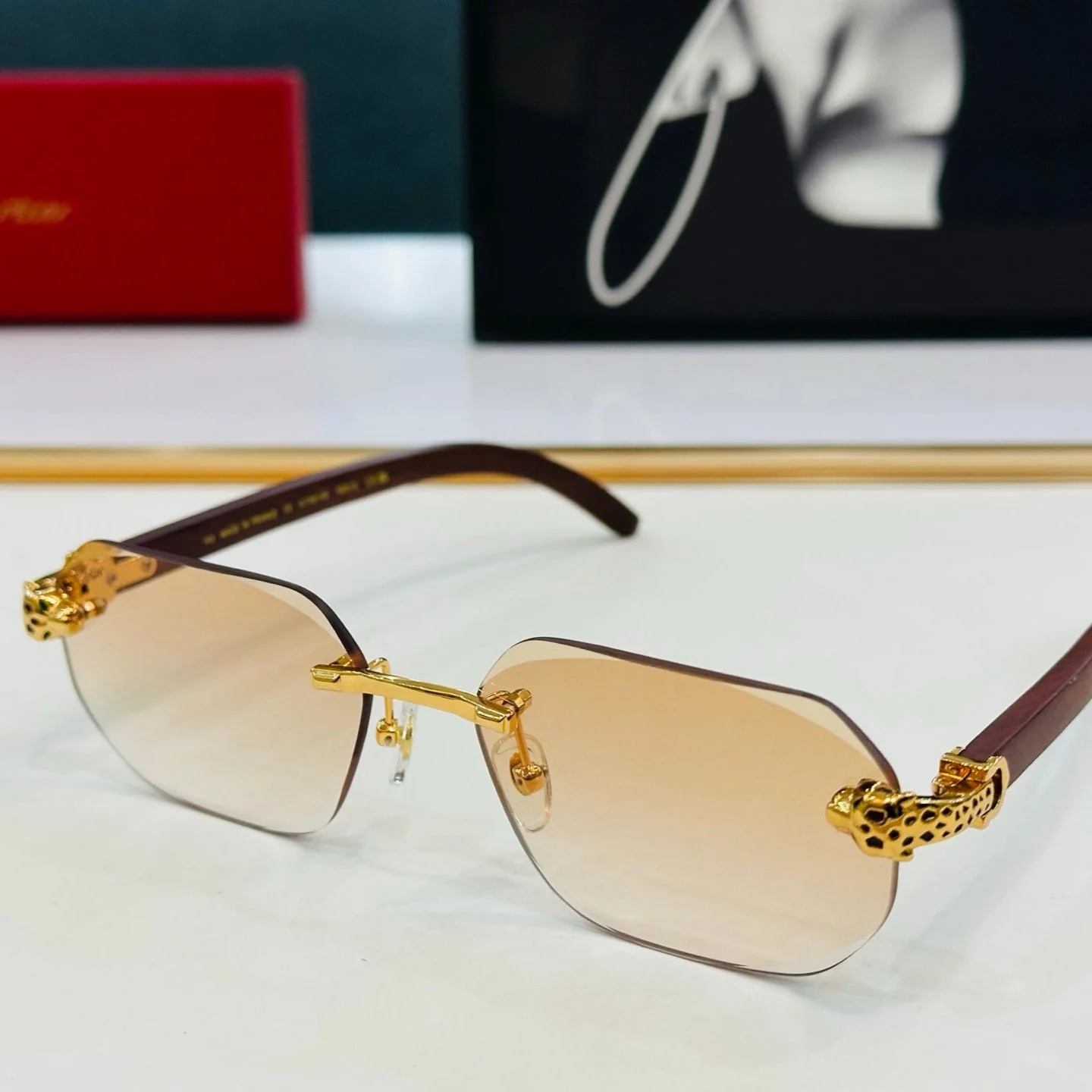 PANTHÈRE RIMLESS OVAL FRAME SUNGLASSES  543637 IN METAL