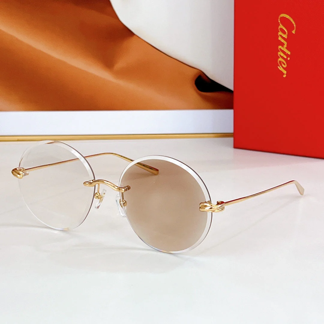PREMIÈRE RIMLESS ROUND FRAME SUNGLASSES CT0475 IN METAL