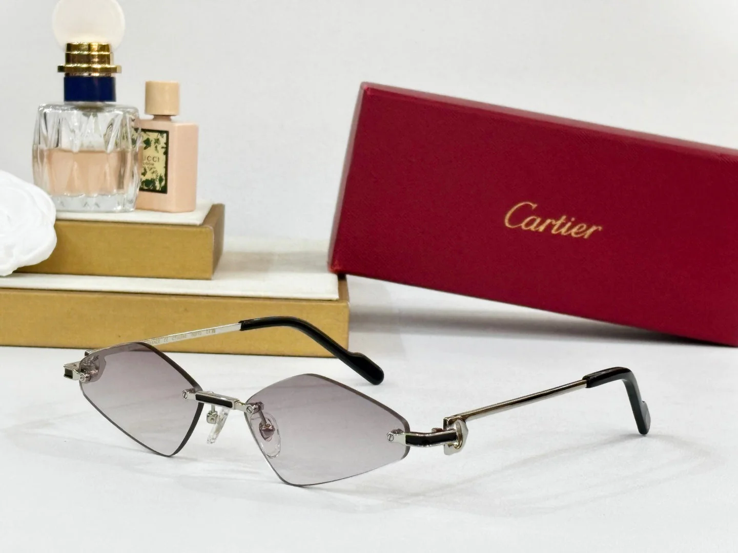 C DE RIMLESS ANGULAR FRAME SUNGLASSES CT0695 IN METAL