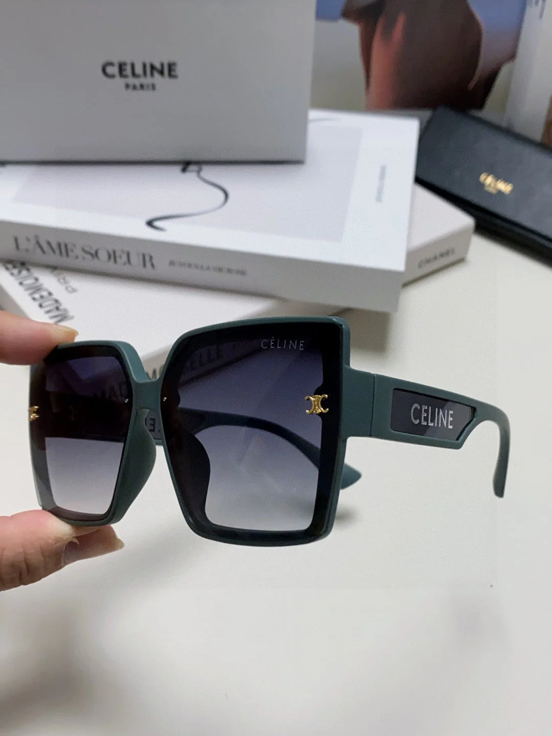 TRIOMPHE SUNGLASSES 573253 IN BABY BLUE ACETATE